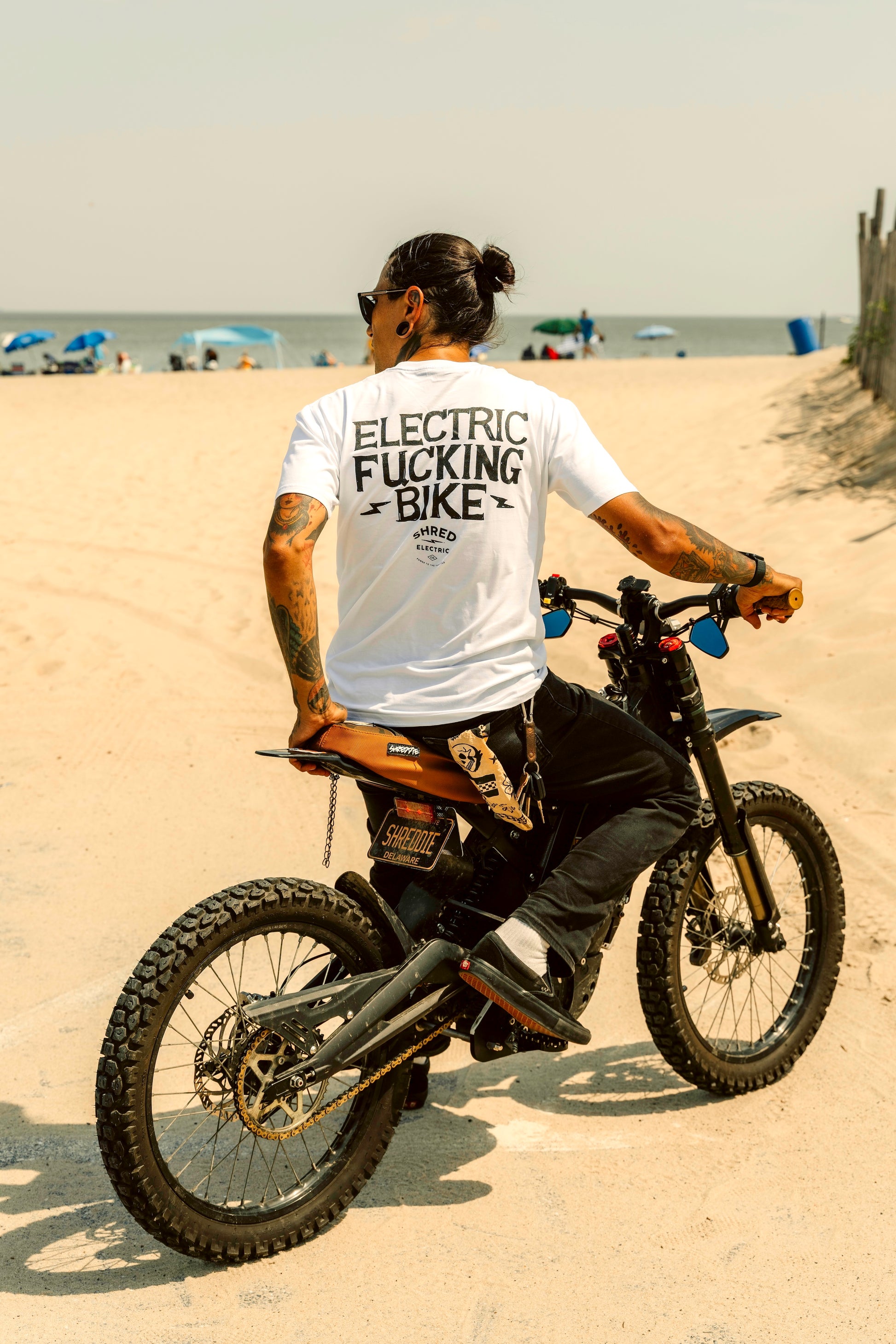 Electric Bike white t-shirt for e-moto riders with beach background