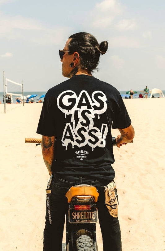Gas Is Ass black t-shirt for electric dirt bike and electric vehicle enthusiasts